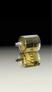 TEKES Arava perfume bottle laying on mirror 